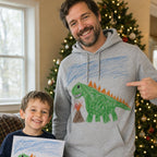 Dad in a grey hoodie printed with his son's dinosaur drawing